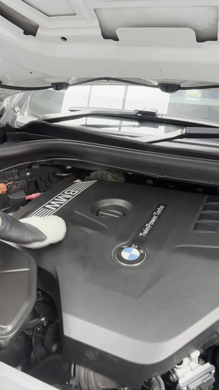 BMW X4 engine bay wipe-down