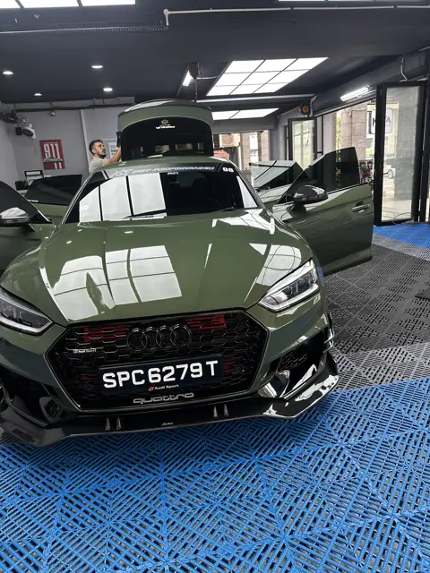 Green Audi RS with gloss black grille at KOYA