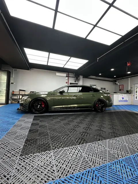 Green Audi RS5 in the KOYA bay