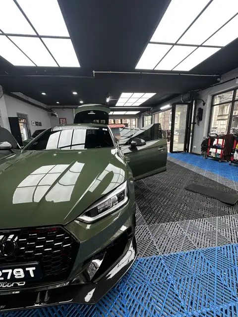 Green Audi RS5 in the KOYA bay
