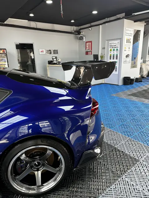 Blue Toyota Supra with carbon bonnet at KOYA