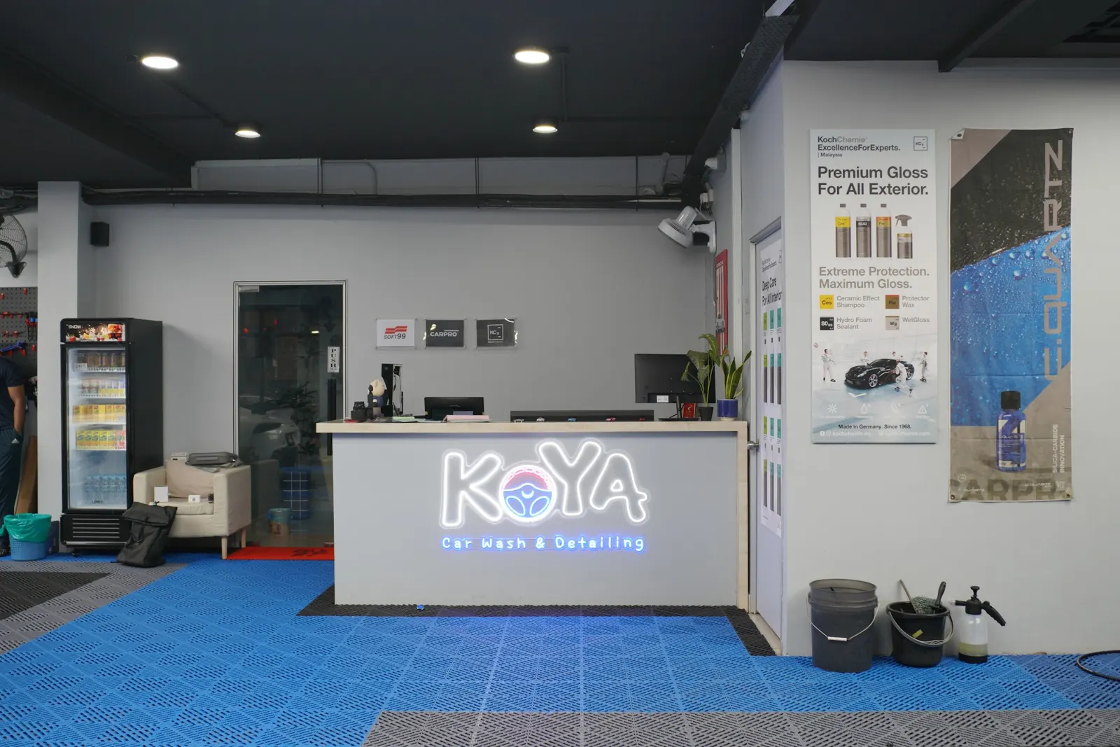 KOYA reception counter with illuminated logo